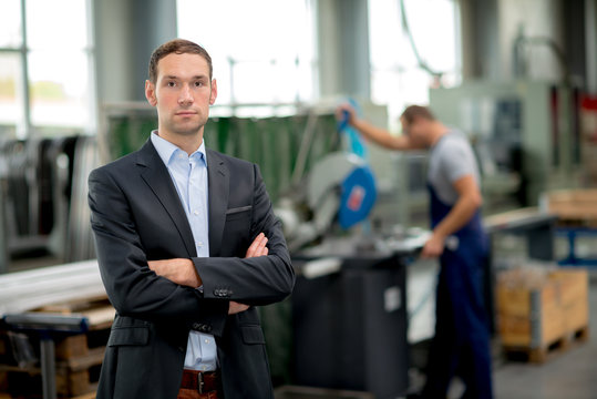 young boss in his factory