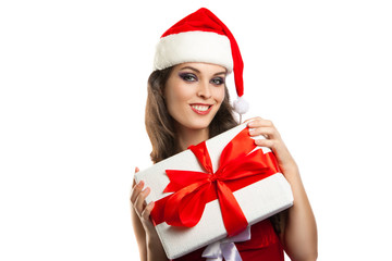 beautiful young girl with a gift in Christmas costumes