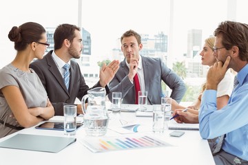Young business people in board room meeting