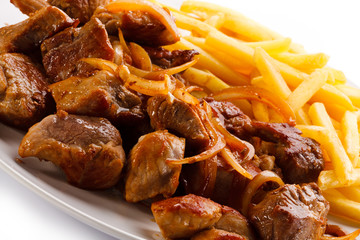 Grilled meat with French fries 