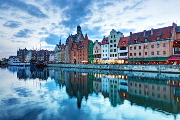 Fototapeta na wymiar View of Gdansk old town and Motlawa river, Poland at sunset