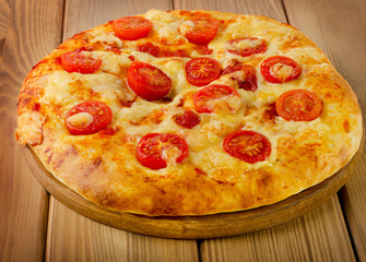Homemade Italian pizza with tomatoes