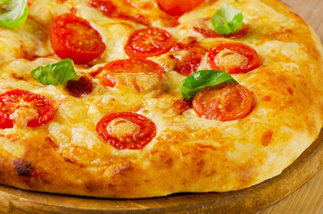 Homemade  pizza with tomatoes