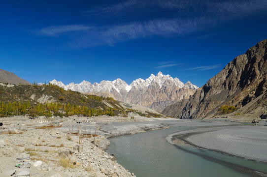 Tupopdan peaks and small river in Northern  Pakistan.