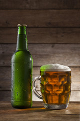 Beer on a wooden background with copy space