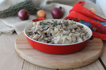 fried oyster mushrooms in sour cream with thyme © joody