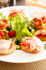 Bruschetta with tomato and ham