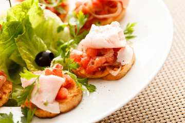 Bruschetta with tomato and ham