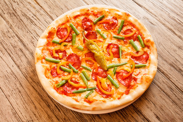 pizza on wooden background