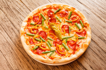 pizza on wooden background