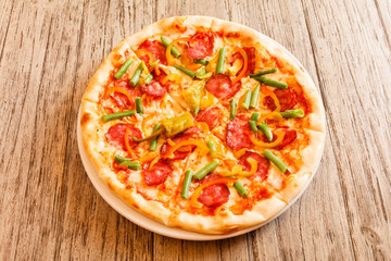 pizza on wooden background