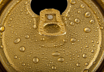 jar of beer in drops of water