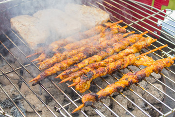 Grill meat is on a grate