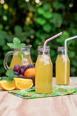 Fototapeta na wymiar Fresh iced drinks with grapes and orange