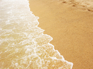 Foamy shoreline in Costa Brava beach at summer