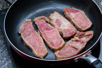 Raw sliced pork grill on the pan