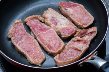 Raw sliced pork grill on the pan