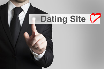 businessman pushing flat button dating site heart