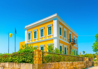 neoclassic yellow old building in Kos island in Greece