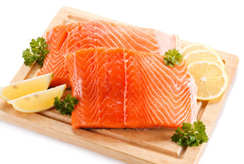 Fresh raw salmon fillet on cutting board