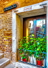 Plakat A beautiful door of an old building at Venice Italy. HDR process