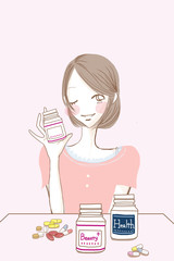 サプリメント錠剤と女性