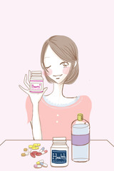 サプリメント錠剤と女性