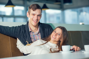 Fototapeta premium Happy couple at the coffee shop, selective focus