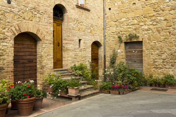 Street corner with old vintage doors in Tuscany