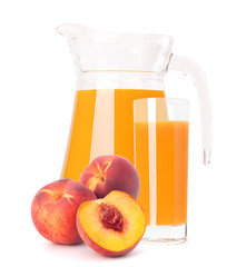 Peach fruit juice in glass jug