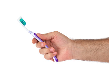 Toothbrush in hand (isolated)