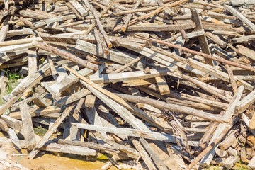Waste wood pile abandon on the ground