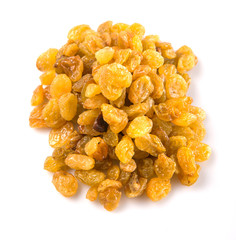 Golden colored dried raisin over white background