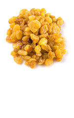 Golden colored dried raisin over white background