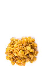 Golden colored dried raisin over white background