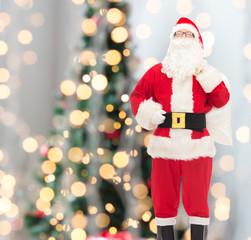 man in costume of santa claus with bag