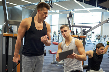Fototapeta na wymiar men exercising on gym machine