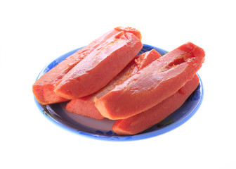 papaya ripe slice on plate isolated