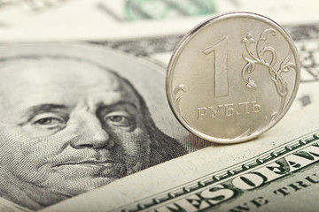 Russian ruble against the background of dollars