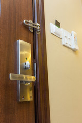 metal door handle on wooden door