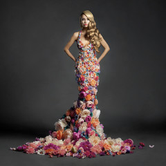 Gorgeous lady in dress of flowers - 73190796
