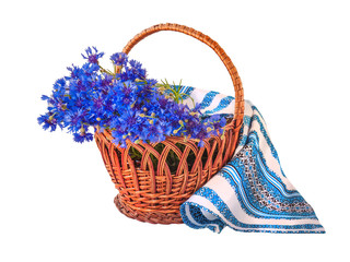 Fototapeta na wymiar Beautiful blue cornflowers in a basket