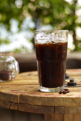 close up cold cappuccino on wooden table