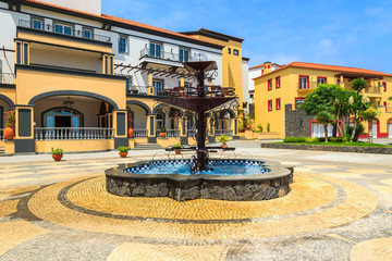 Fototapeta na wymiar Square with water fountain in luxury hotel on Madeira island