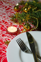 Christmas and New Year table place setting with christmas decora