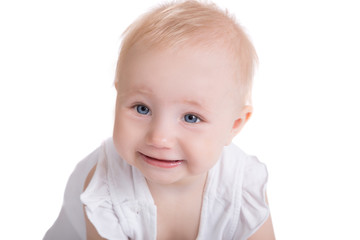 Little playing smiling child isolated on white backgroung