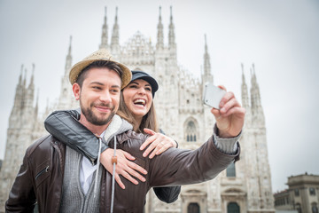 Tourists at Duomo cathedral,Milan - obrazy, fototapety, plakaty