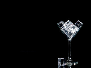 Cocktail Glass on Black with Ice