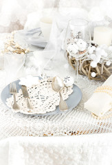 Christmas Table Setting with traditional Holiday Decorations