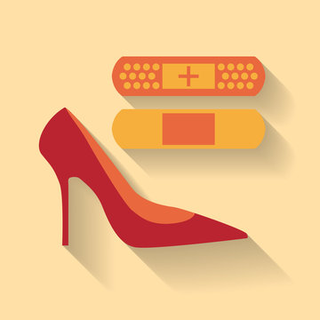 Two adhesive bandages and single red high-heeled shoe